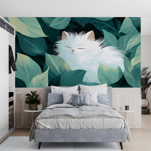A cozy bedroom with a white cat leaf wallpaper feature wall behind a light oak wooden bed frame