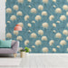 Dusty blue floral wallpaper behind a wooden headboard in a cozy entryway
