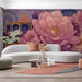 A romantic hallway featuring a royal carriage and floral mural behind a tufted velvet headboard.
