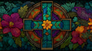 Stained glass cross surrounded by fuchsia flowers, orange blossoms, and dark foliage
