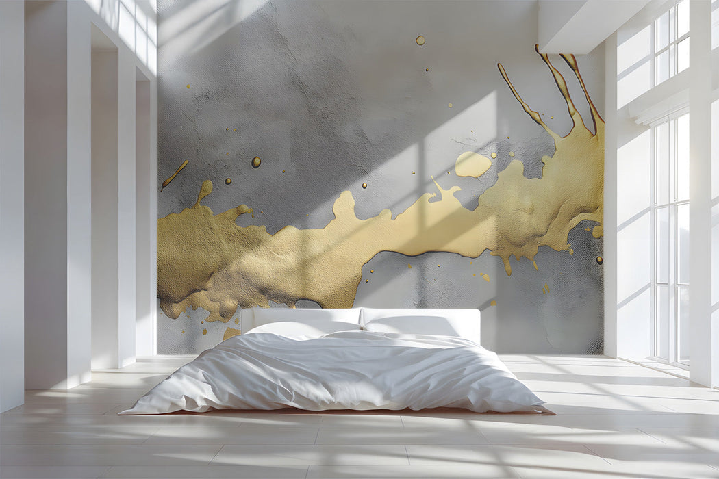 Sophisticated bedroom space featuring artistic gold splatter mural wallpaper above a minimalist desk.