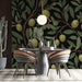 Cozy bedroom interior with botanical branch wallpaper on the feature wall