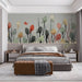 A cozy bedroom corner showing the bird flock pattern creating a soft and playful feature wall.