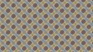 A geometric wallpaper pattern with a quatrefoil floral motif in navy, terracotta, and olive green on a light background.