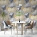 A sophisticated dining room with the vintage-inspired botanical mural on the wall.