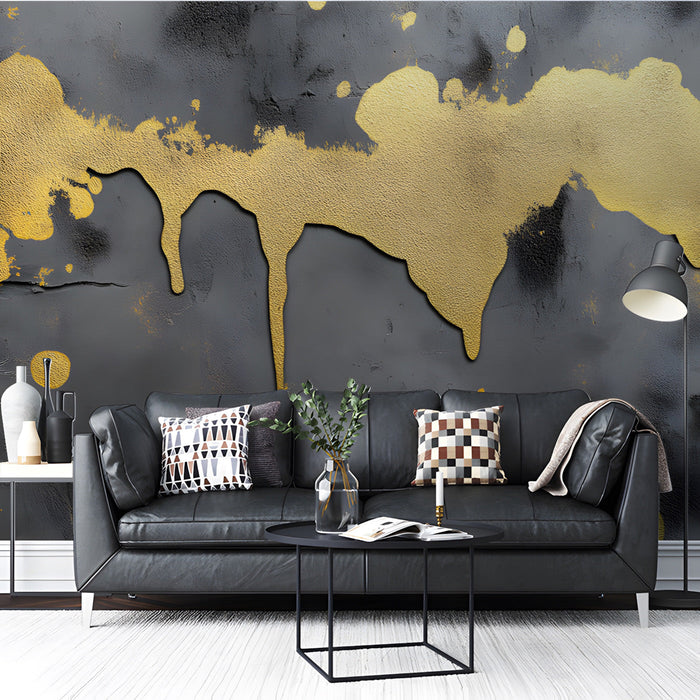 Living room wall featuring charcoal and gold dripping paint mural behind a modern velvet sofa