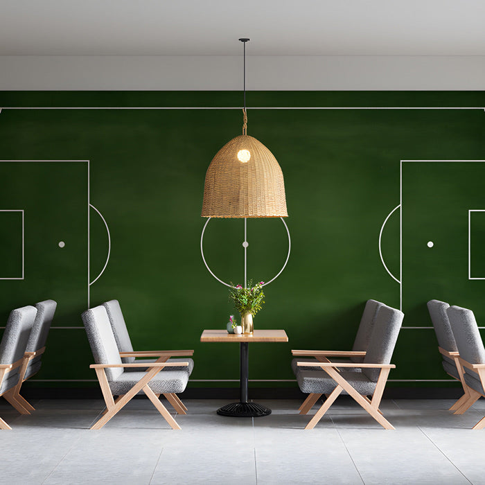 Sport themed cafe wall featuring a soccer pitch mural