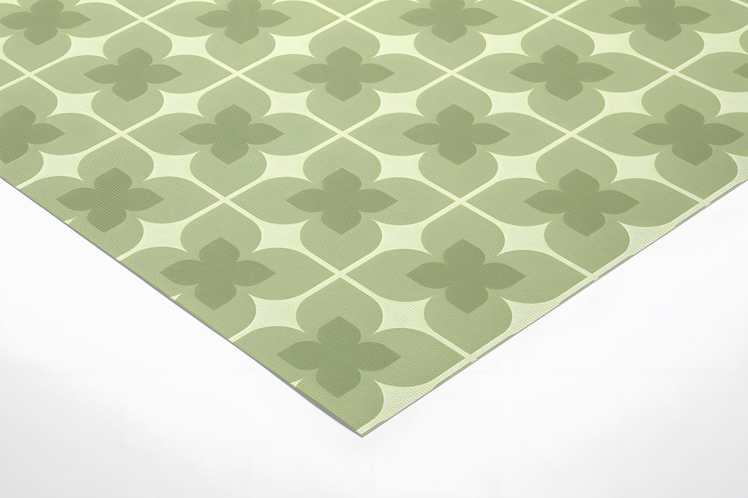 Sage green clover mural featured on the main wall of a minimalist home office.