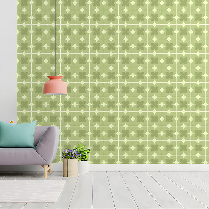 Geometric sage green clover wallpaper installed in a bright study.