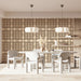 Meeting room wall featuring a neutral geometric petal mural behind a low-profile cream sofa.