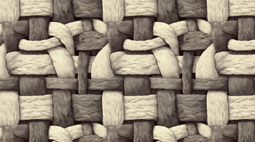 Close up of an oversized woven textile pattern in charcoal, gray, and cream tones.