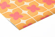 Sunroom featuring 70s style floral geometric mural on feature wall