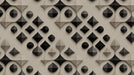 Abstract geometric diamond pattern with 3D depth in charcoal and beige tones.