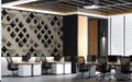 Geometric diamond wallpaper installed on a feature wall in a minimalist office room.