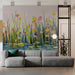 Floral marshland mural installed on a feature wall in a sunlit living room with neutral furniture.