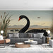Calm living room interior with a black swan mural creating a serene focal point