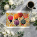 Rainy city street scene wallpaper featuring umbrellas in a bright modern dining room