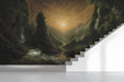 A formal exhibition featuring a grand landscape wall mural above a velvet sofa.