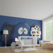A colorful playroom with a whimsical elephant mural that sparks creativity in children.