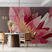 A stylish dining room featuring an oversized pink floral wallpaper mural on the main wall.