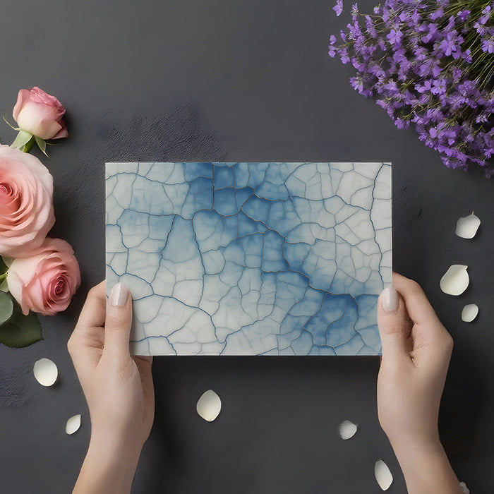 Bedroom wall covered in a serene indigo crackle pattern with soft blue tones