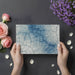 Bedroom wall covered in a serene indigo crackle pattern with soft blue tones