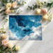 Abstract blue sky wallpaper featured in a calming home office with a minimalist oak desk