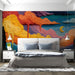 Bedroom featuring a vibrant impasto landscape mural behind a mid-century modern sofa.