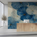 Soft blue botanical mural wallpaper installed in a serene reception behind a headboard