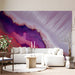 Minimalist living room interior with an abstract purple and coral feature wall