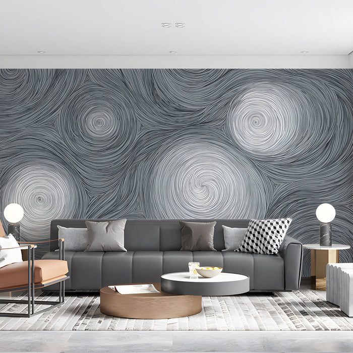 A modern living room featuring a swirling gray line art feature wall behind a minimalist velvet sofa.