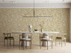 Damask fern wallpaper installed behind a neutral sofa in a cozy meeting room