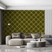 Geometric olive green wallpaper in a cozy commercial space with wooden mid-century desk furniture.