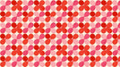Retro geometric floral wallpaper with repeating red and pink rounded petals on cream