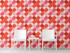 Modern living room with a red and pink retro floral wallpaper feature wall