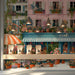 A sunlit shop decorated with a vibrant Parisian cafe wall mural