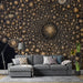 A moody library or living room featuring the gold starburst celestial mural as a statement focal point.
