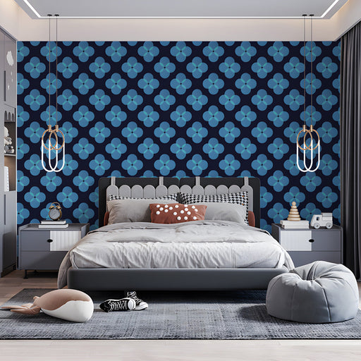 Bedroom wall featuring a modern blue geometric clover wallpaper pattern