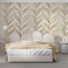 Sophisticated bedroom featuring light neutral textured wallpaper