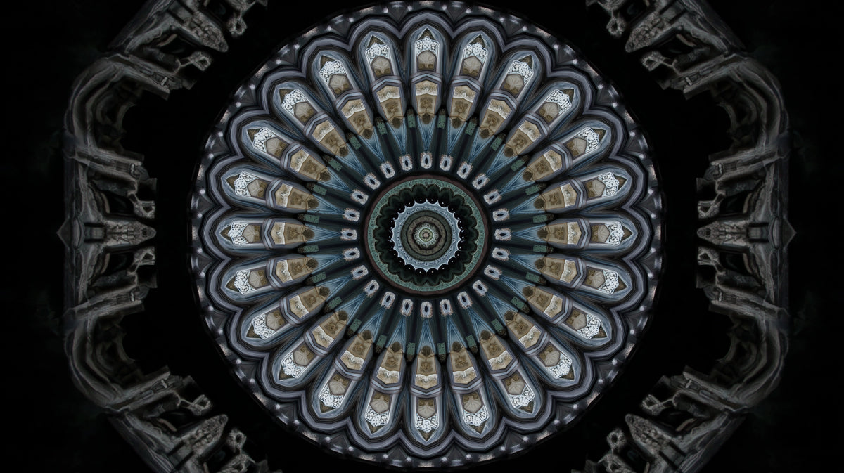 A dark, moody kaleidoscope pattern resembling gothic cathedral arches in shades of charcoal, gray, and stone.
