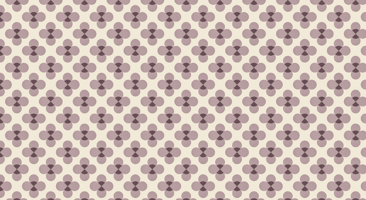 Repeating geometric clover pattern in soft dusty mauve, deep charcoal, and cream.