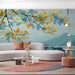 Living room wall mural featuring a calm lake scene and painterly boats