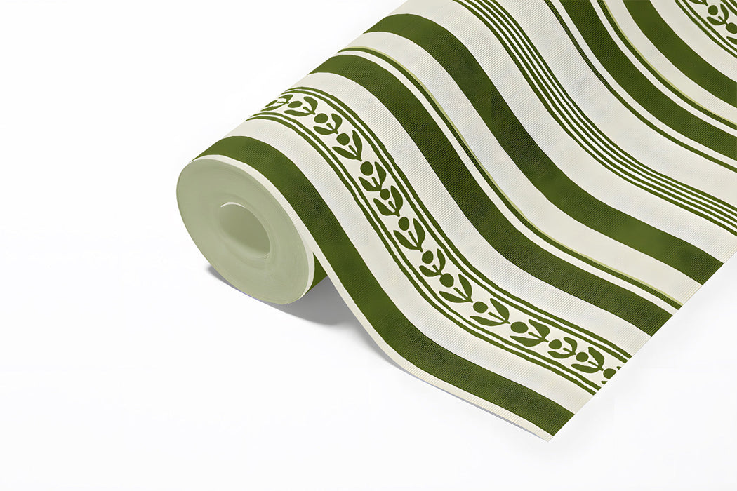 Traditional leaf stripe wallpaper installed in a bright home office with brass accents