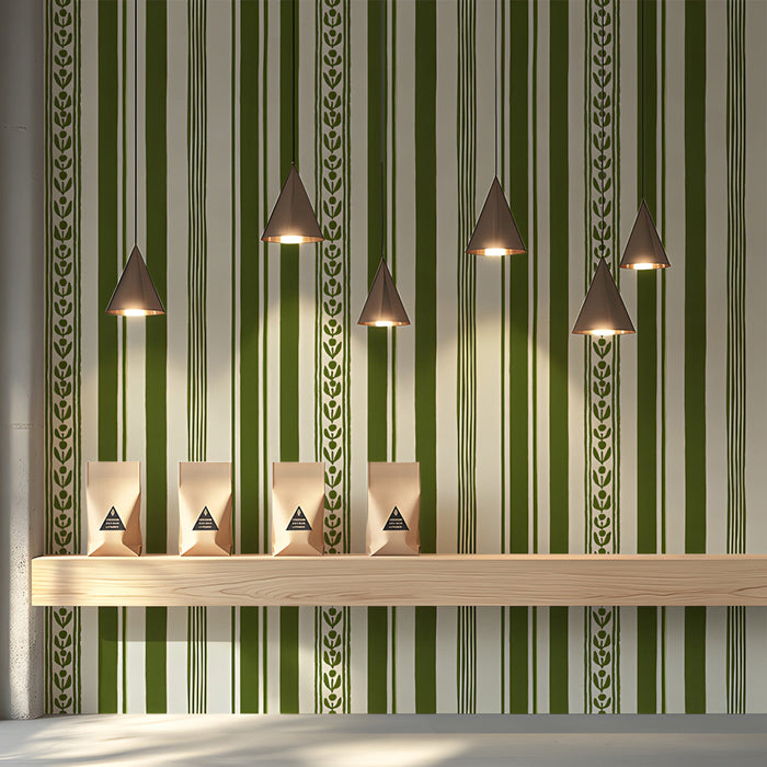 Striped olive green botanical wallpaper featured in a cozy shop with wooden furniture