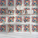 Modern study with colorful watercolor dot wallpaper on the main feature wall