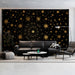 A refined lounge or bar area showcasing the dark gold and black star pattern for a moody interior look.