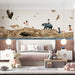 A cozy bedroom featuring a children and wildlife mural behind a white wooden crib.