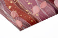 Abstract botanical wall mural featured in a contemporary living room with velvet seating