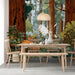 Detailed woodland mural in a library reading room with a plush armchair and warm lighting