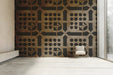 Hallway featuring a mid-century geometric mural wall with minimalist furniture